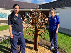 Hope House Children's Hospice nurses Amy Williams and Gemma Jones with the community tree