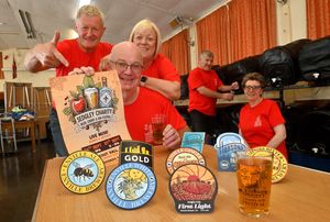 Sedgley Scouts Jubilee Hall, being taken over for the 11th Sedgley Charity Beer, Cider and Gin Festival, raising much needed money for charity. Front kneeling is: David Baugh with Ian Foster and Debra Baugh, and at the back: David Mitchell and Annette Mitchell.