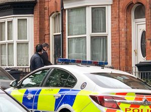 Police search a property in Birmingham. Photo: @SnapperSK