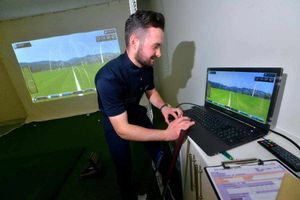 PGA professional Dan Leeke checks out Shropshire Star sports editor Russell Youll's progress and then passes on a few words of advice