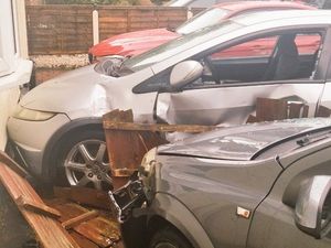 Supporting image for story: Teenagers flee from stricken car crashed through front gardens