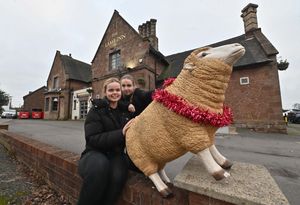 The Lamb Inn with staff, Emily Newbold and Tia Rushall, with Arlo the sheep