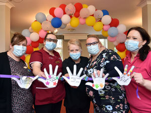 Supporting image for story: Children show appreciation for carers with handmade 'hands of kindness'