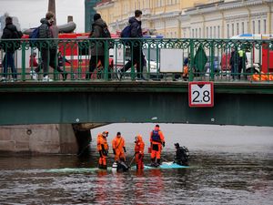 Supporting image for story: Seven dead after bus plunges from bridge in St Petersburg