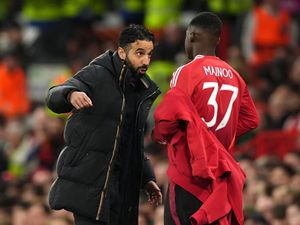 Supporting image for story: Man Utd star’s half-brother wears ‘Free Kobbie Mainoo’ shirt to Bournemouth draw