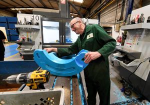 A worker at RunFlat International, Cradley Heath, which has won the prestigious King's Award for Enterprise