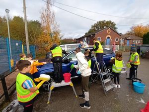 Supporting image for story: Staffordshire primary school pupils shine bright with charity car wash for cancer support
