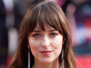 Supporting image for story: Dakota Johnson likes being ‘cosy and private’ with partner Chris Martin