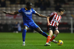 Jason Sraha of Shrewsbury Town and Conor McGrandles of Lincoln City (AMA)