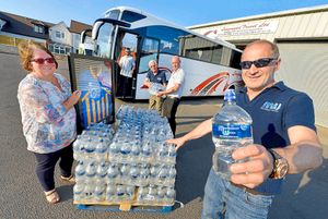 Paul Delves with some of the water being provided for fans
