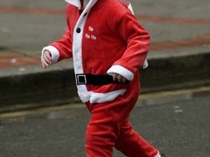 Supporting image for story: Hundreds join in fun on Santa Run