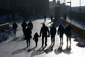 Wolves fans head to the ground in the snowy conditions (Photo by Shaun Botterill/Getty Images)