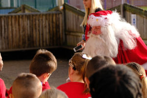 The longest serving Santa Ray Hulse, 76 from Bridgenorth has paid a socially distanced visit to Windmill Primary School in Telford to deliver goodies to the excited children. See SWNS story SWMDsanta. December 11, 2020.