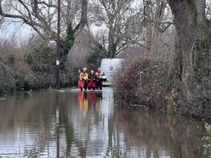 Supporting image for story: Stranded motorist rescued by firefighters after driving into flood water in Shropshire village