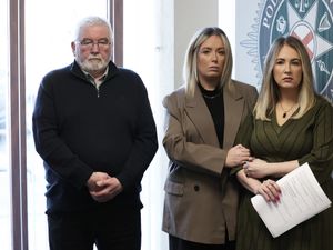 Lisa Dorrian’s father John and sisters Michelle and Joanne, during an appeal on the 20th anniversary of Lisa’s disappearance, at PSNI headquarters in Belfast