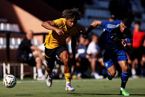 Pedro Lima drives at the defence (Jack Thomas/Getty)