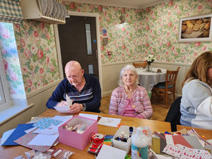 Residents and guests at HC-One’s Foley Grange Care Home crafting Christmas cards