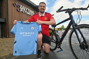 Stuart Bull has cycled to every Premier League stadium for charity. Manchester City gave him a shirt signed by Josko Gvardiol.