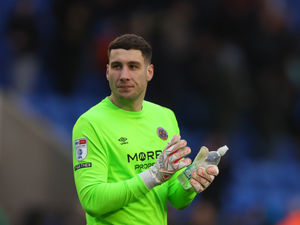 Supporting image for story: Former Shrewsbury keeper signs for England legend 