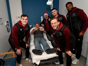 Walsall FC players visit Walsall Manor HospitalPlayers meet Saddlers fan John Lewis.