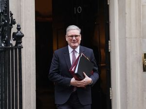 Sir Keir Starmer on the doorstep of No 10 Downing Street, carrying files