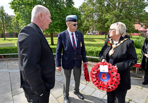 Hillary Bills chats to visitors at the Dudley remembrance event