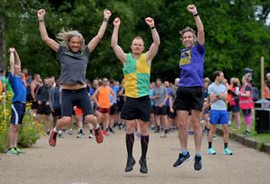 Telford Harriers members Mark Griffiths, Thomas Hales and Steve Walker celebrate