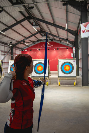 Olympian Penny Healey shooting in the Performance Archery Centre, in Lilleshall
