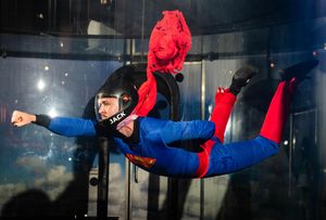 An iFly coach at The Bear Grylls Adventure in Birmingham recreates an iconic Superman flying scene