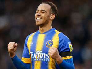 Supporting image for story: "A massive highlight..." Elliott Bennett gives thanks after Shrewsbury Town exit
