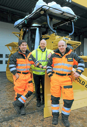 Spencer Smirl, left, and Richmond Dykes, right, with Andy Thomas