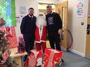 Supporting image for story: Bloxwich opticians spreads festive cheer with donation to local CAMHS unit