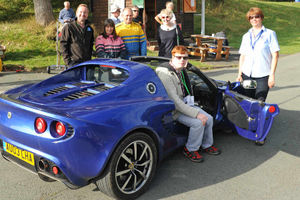 Ready for action, Tommy O'Callaghan with Annie Goodyear and the Lotus Elise at Loton Park.