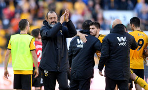 Nuno Espirito Santo applauds the home fans at full time (AMA)