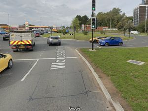 Supporting image for story: Two people treated by ambulance staff in four-vehicle crash