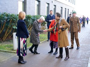 The Princess Royal is greeted by staff as she arrives for a visit to Southmead Hospital in Bristol