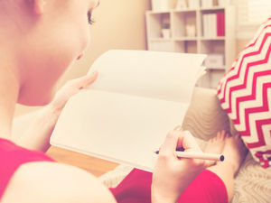 Supporting image for story: Talking point: Author Anouska Knight is write on and putting pen to paper 