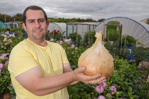 Chris with a giant onion
