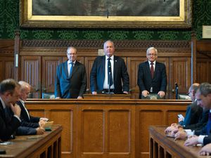 1922 Committee chairman Bob Blackman, flanked by Tory MPs