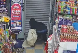 Moment West Midlands armed robber Jordan Peebles gets trapped inside shop he tried to rob.