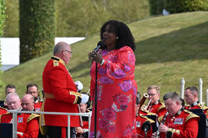 Ruby Turner sings for the crowd during the national Service of Remembrance, hosted by the Royal British Legion in partnership with the Government, to mark the 80th Anniversary of VJ Day at the National Memorial Arboretum in Alrewas, Staffordshire. Picture date: Friday August 15, 2025. PA Photo. Photo credit should read: Anthony Devlin/PA Wire 