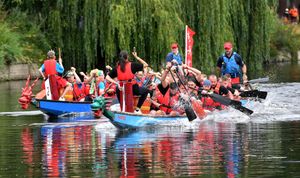 Racing gets competitive in a tight encounter at the Severn Hospice Dragon Boat Festival