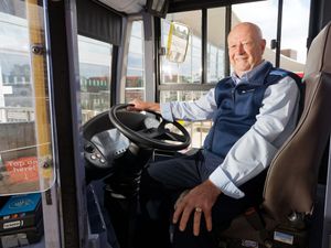 Supporting image for story: Longest serving bus driver vows to stay behind wheel