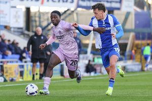 Ismeal Kabia of Shrewsbury Town and Luke Hannant of Oldham Athletic