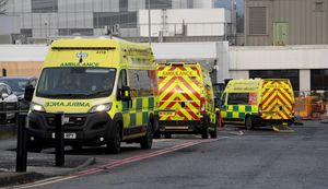 Ambulances wait outside Russells Hall Hospital.