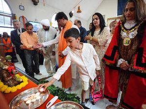 Supporting image for story: Community visibly emotional during candlelit vigil for Air India crash victims