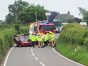Supporting image for story: Elderly woman taken to hospital after car rolls on to roof near Market Drayton
