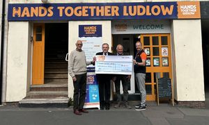 Patrick Caine, Andy Corbett and Richard Collishaw (Ludlow Freemasons) presenting Andy Fensome (Hands Together Ludlow) with a cheque for £1000.
(Left to Right)