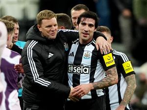 Newcastle manager Eddie Howe, left, and Sandro Tonali embrace at full-time