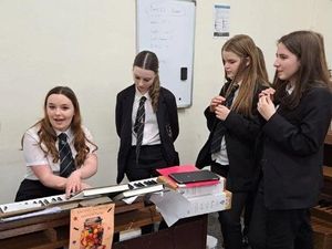 Nieve Wheway (Year 10 student) showcasing her talents to fellow students  Amelia Gandy, Hannah Roelake and Polina Tarabanovska (Year 9 students).